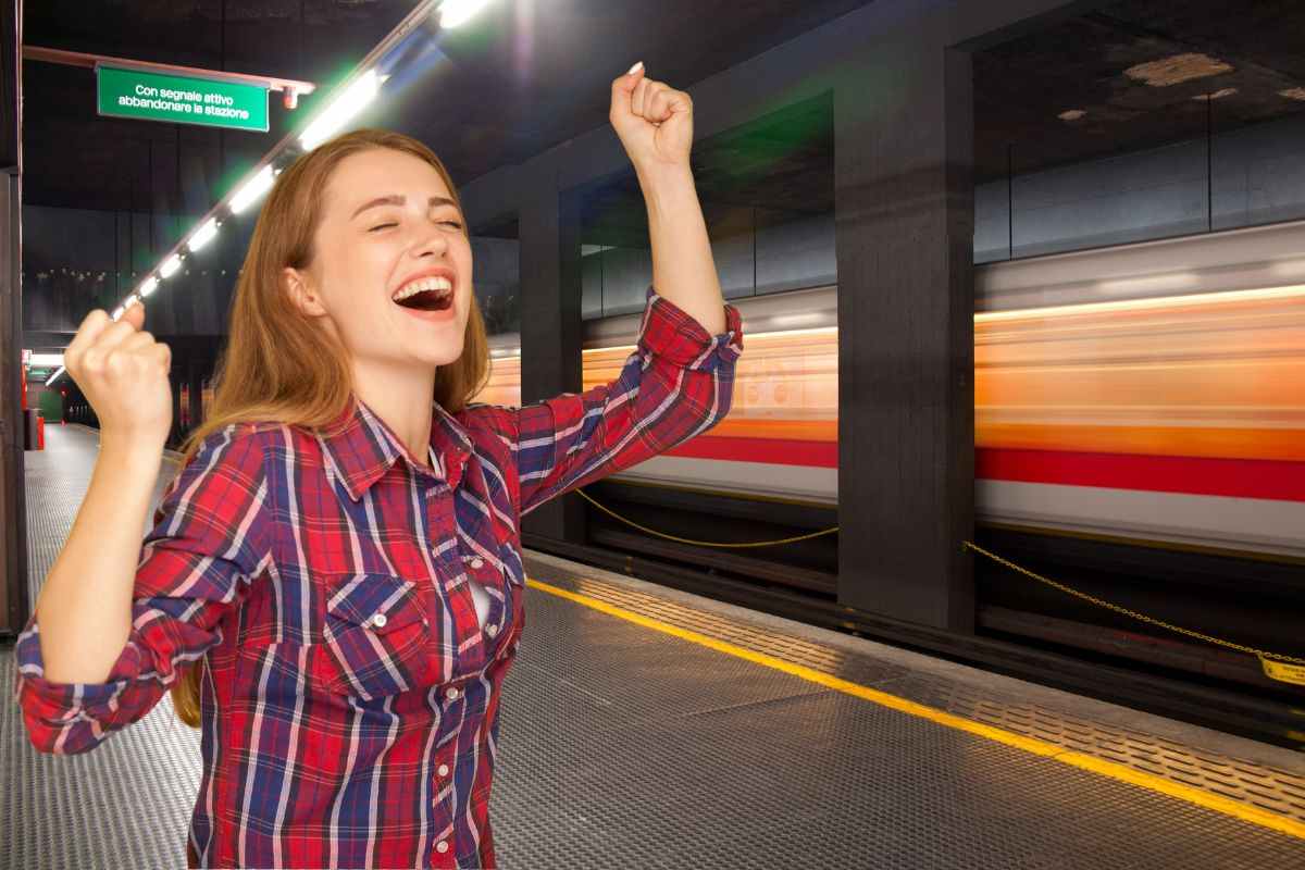 metro e donna che esulta